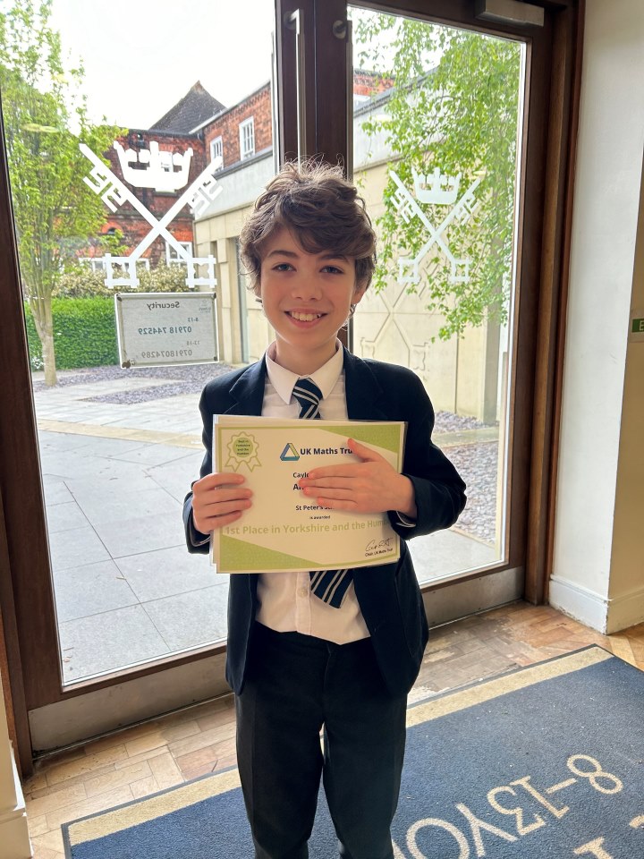 Alex Triumphs Again in Maths Olympiad